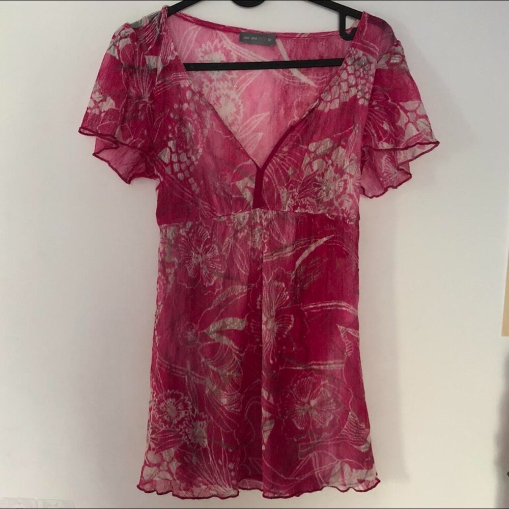 Women's top, worn a few times; 50% new condition.